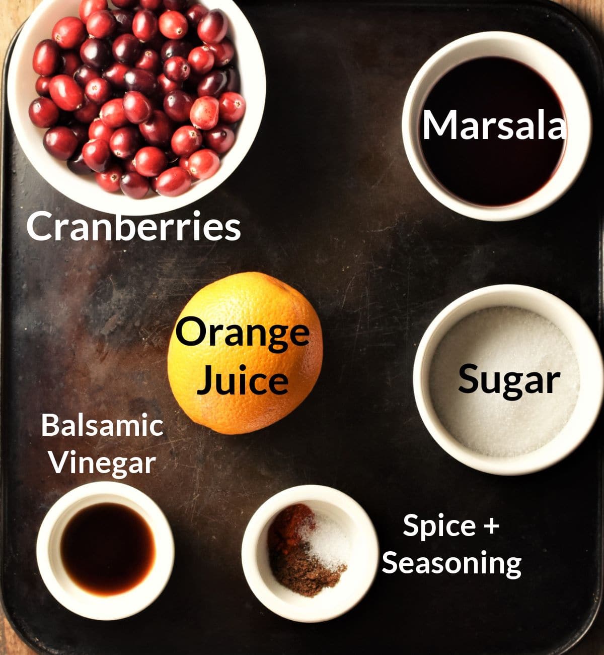 Ingredients for making low sugar cranberry sauce in individual dishes.
