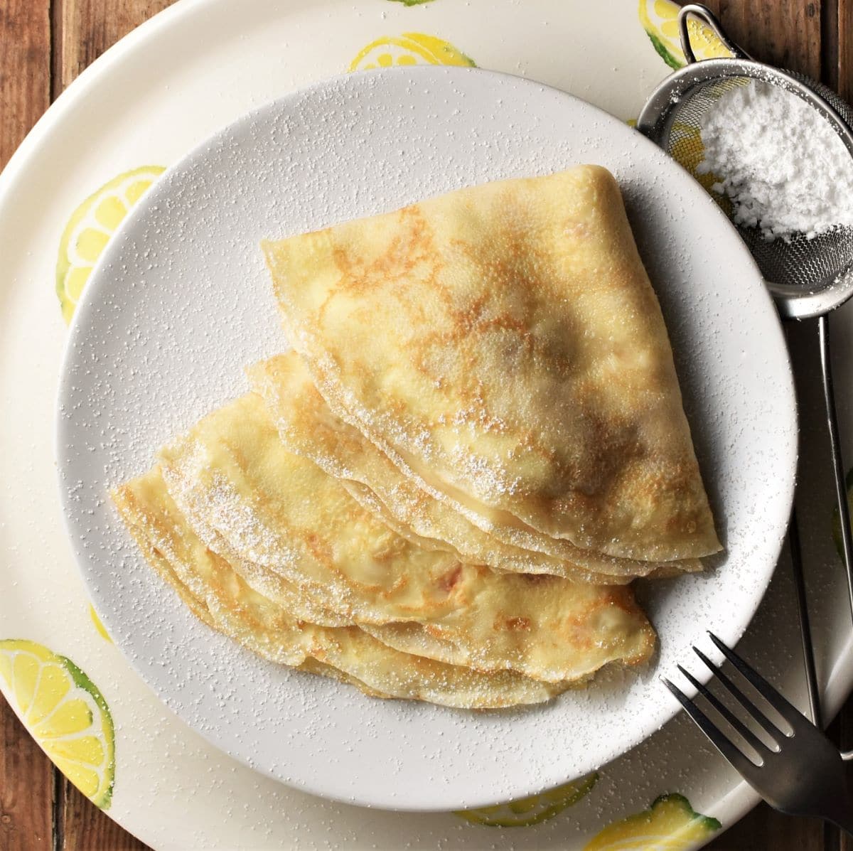 2 folded crepes on top of plate.