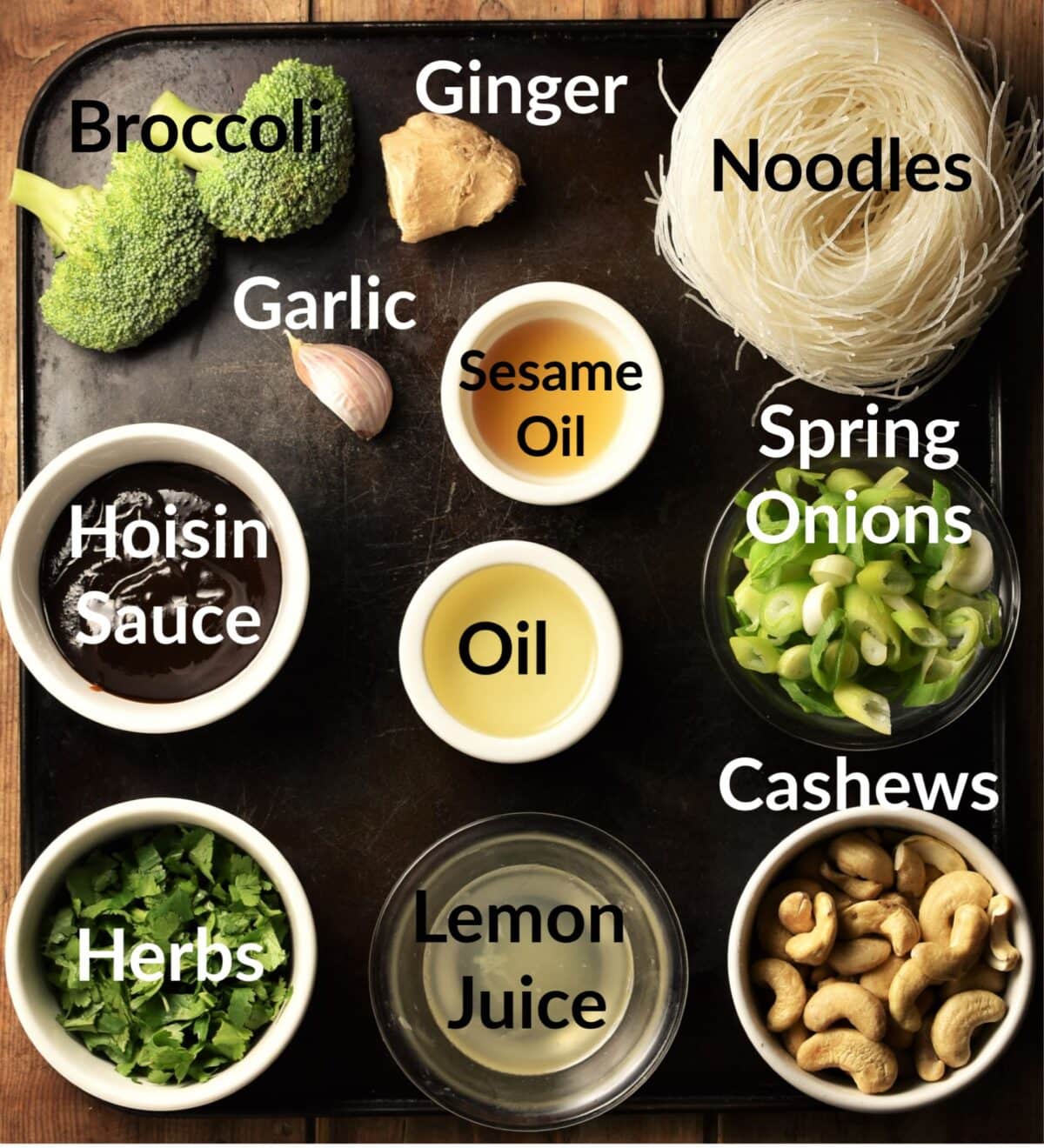 Noodle salad ingredients in individual dishes.
