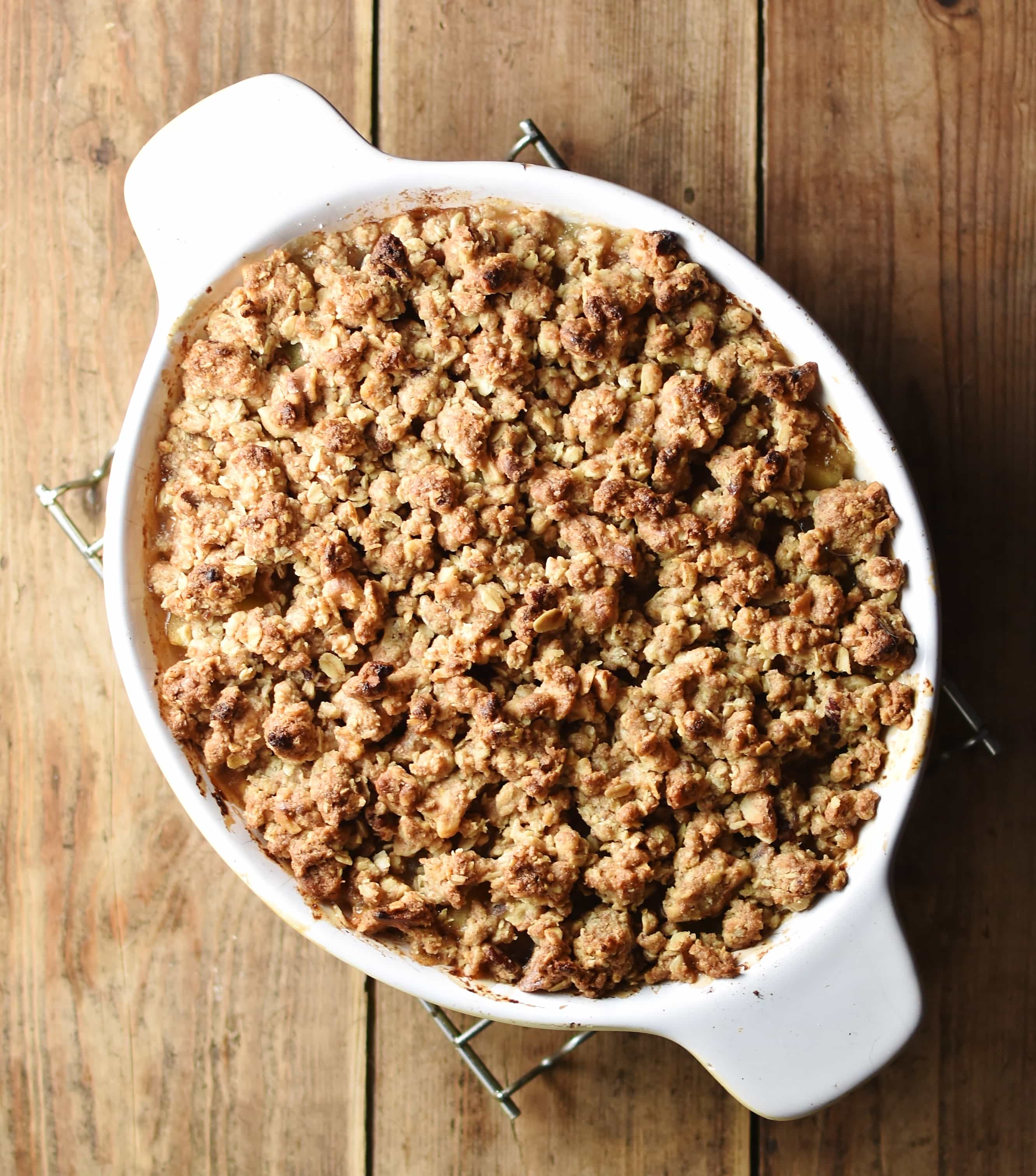 Crispy crumble in white oval dish.