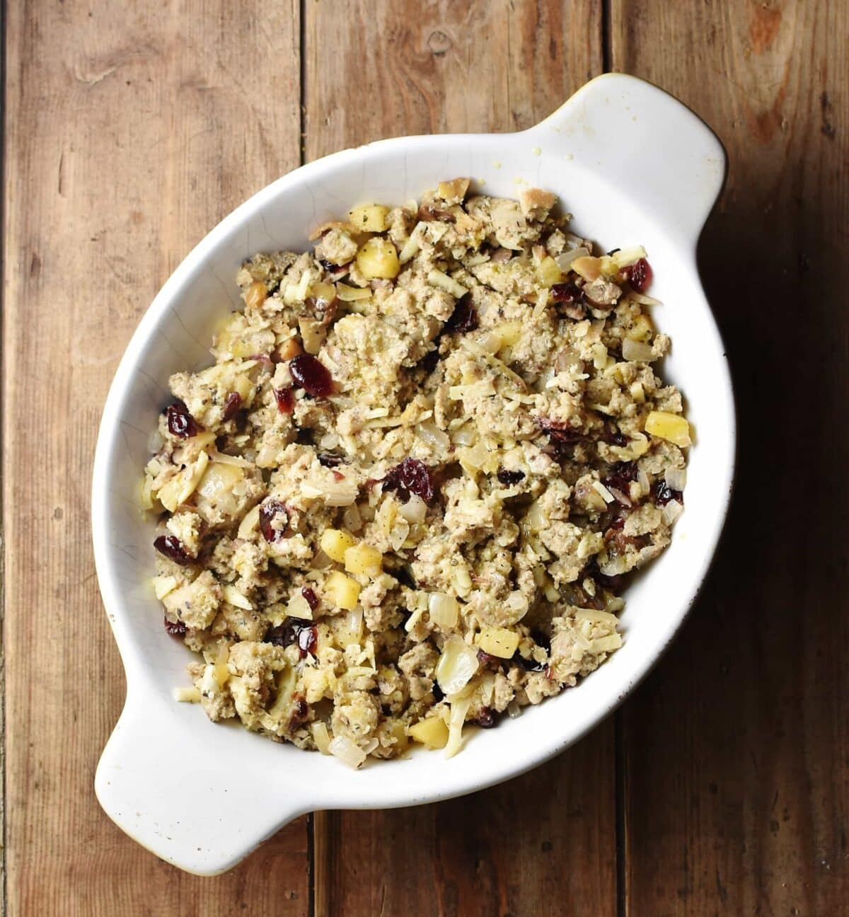 Vegetarian stuffing in white oval dish.