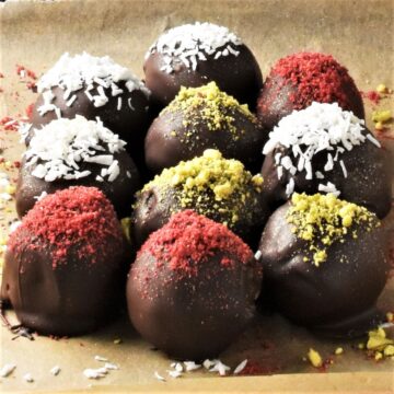 Side view of chestnut truffles on top of parchment.
