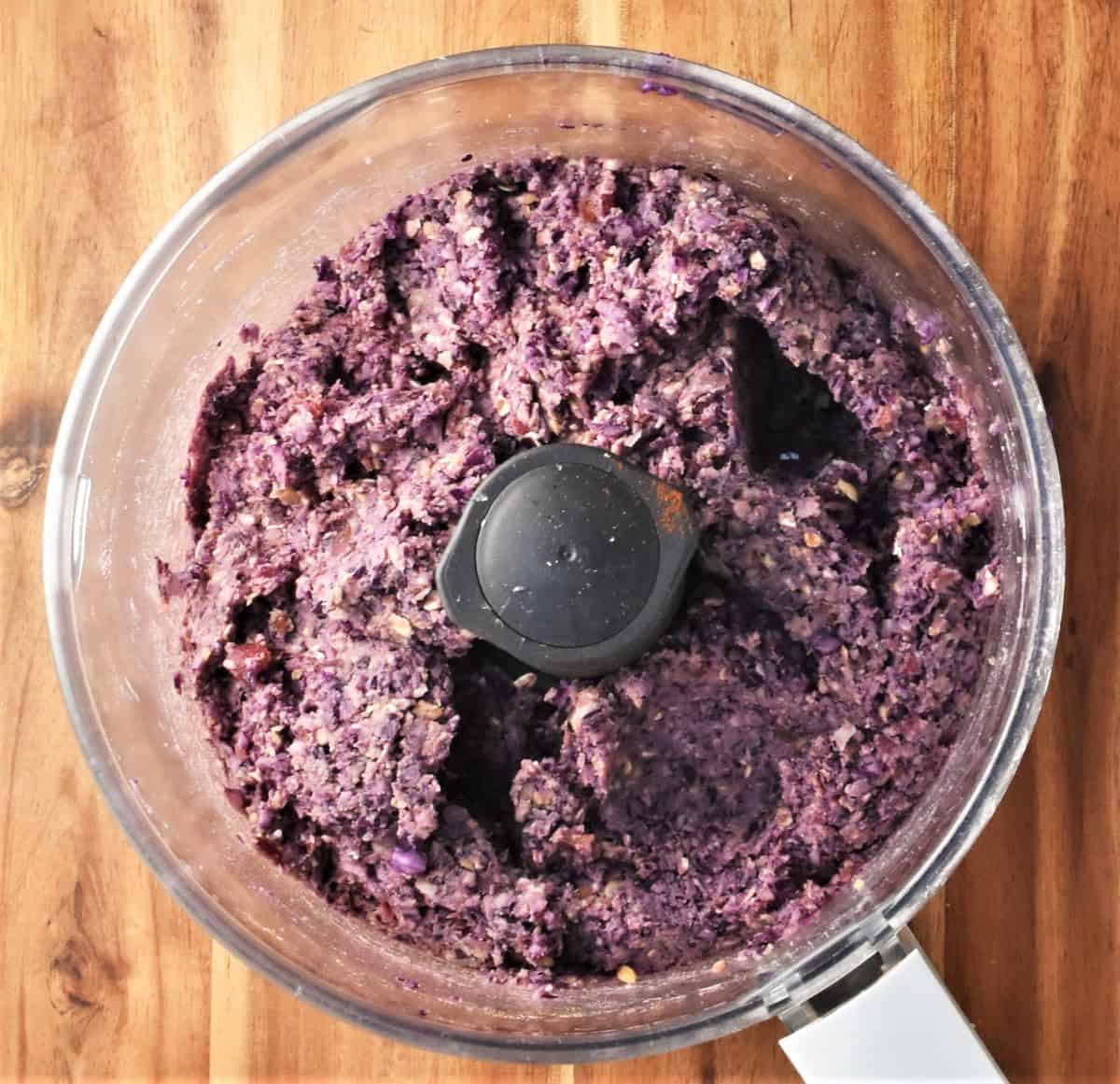 Sticky cabbage patties mixture in blender bowl.