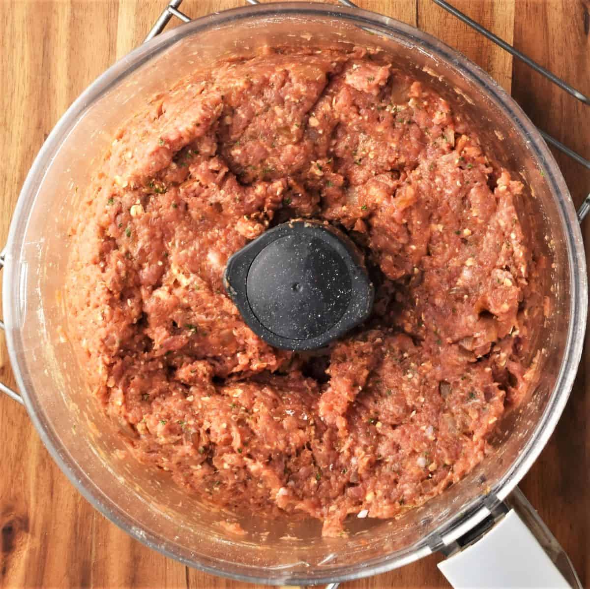 Meatloaf with oats mixture in blender bowl.