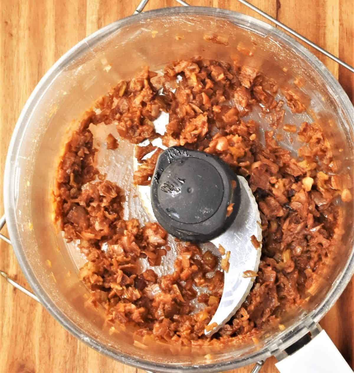Fried onion in food processor bowl.